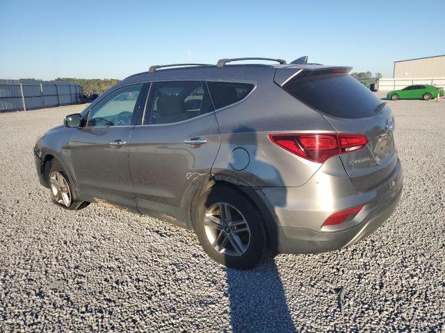 Photo 2 from auction – 2018 HYUNDAI SANTA FE S with VIN 5NMZU3LB1JH063572