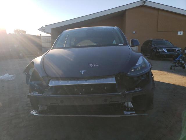Photo 5 from auction – 2022 TESLA MODEL Y with VIN 7SAYGDEF7NF405710