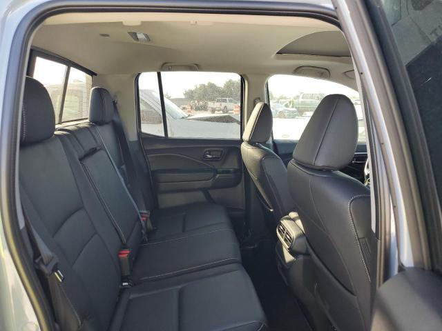 Photo 10 from auction – 2024 HONDA RIDGELINE with VIN 5FPYK3F56RB013438