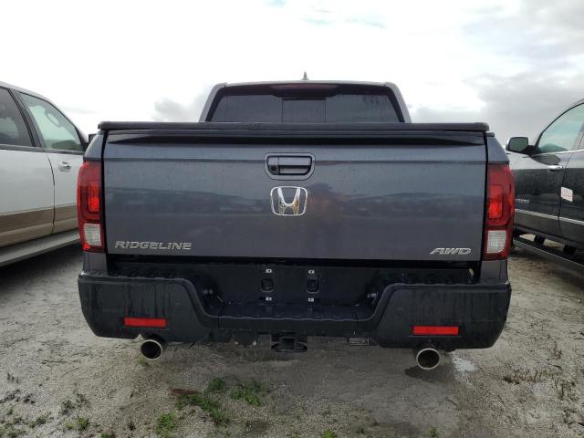 Photo 6 from auction – 2023 HONDA RIDGELINE with VIN 5FPYK3F78PB065636
