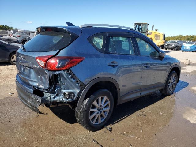 Photo 3 from auction – 2015 MAZDA CX-5 SPORT with VIN JM3KE2BE5F0529619