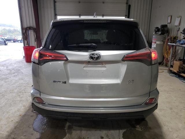 Photo 6 from auction – 2018 TOYOTA RAV4 LE with VIN 2T3BFREV8JW850178