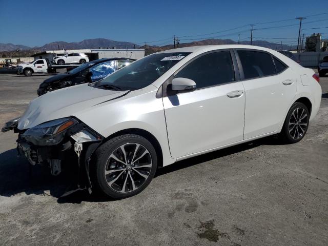 TOYOTA COROLLA L 2017 with VIN 5YFBURHE0HP720708 - Photo from auction