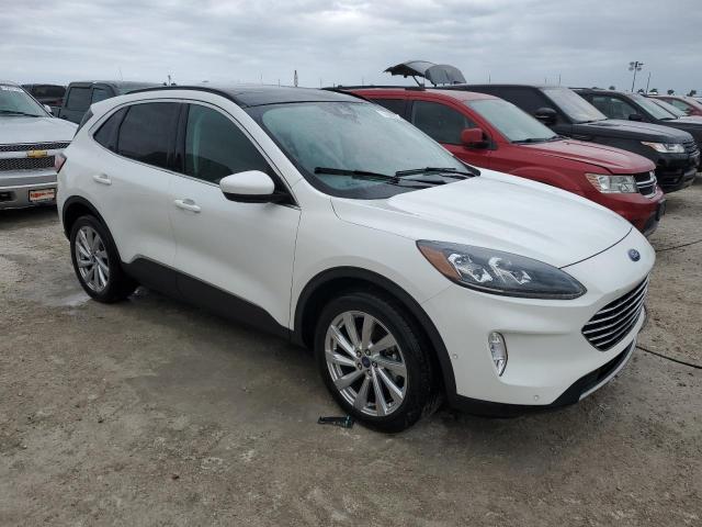 Photo 4 from auction – 2021 FORD ESCAPE TIT with VIN 1FMCU9J92MUB35736