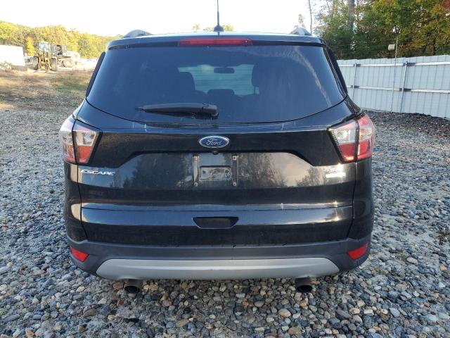 Photo 6 from auction – 2018 FORD ESCAPE SE with VIN 1FMCU9GD3JUA32123