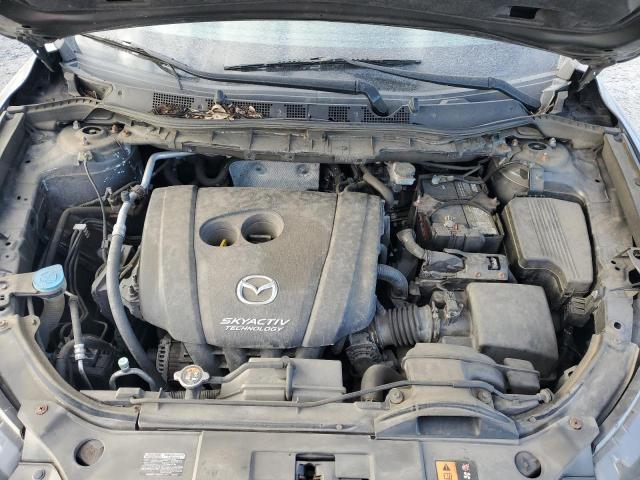 Photo 11 from auction – 2014 MAZDA CX-5 SPORT with VIN JM3KE4BE4E0313447