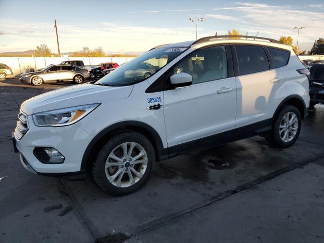 FORD ESCAPE SE 2018 with VIN 1FMCU9GD1JUC20011 - Photo from auction