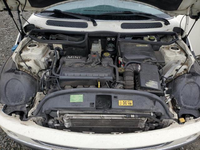 Photo 11 from auction – 2004 MINI COOPER with VIN WMWRC33454TJ53408