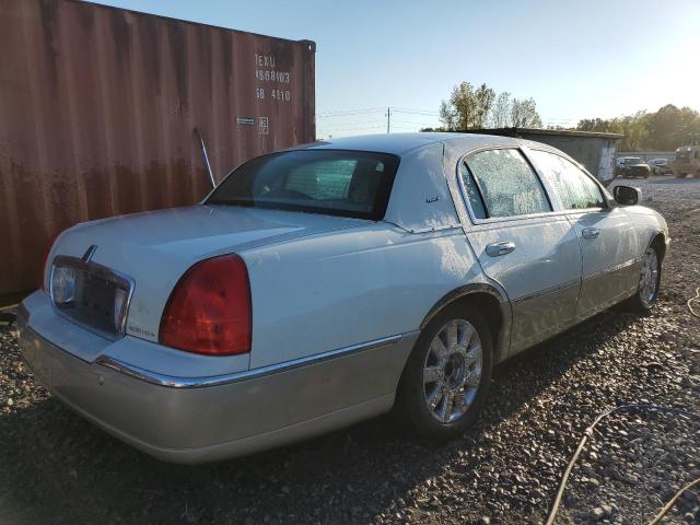Photo 3 from auction – 2004 LINCOLN TOWN CAR U with VIN 1LNHM83W64Y664697
