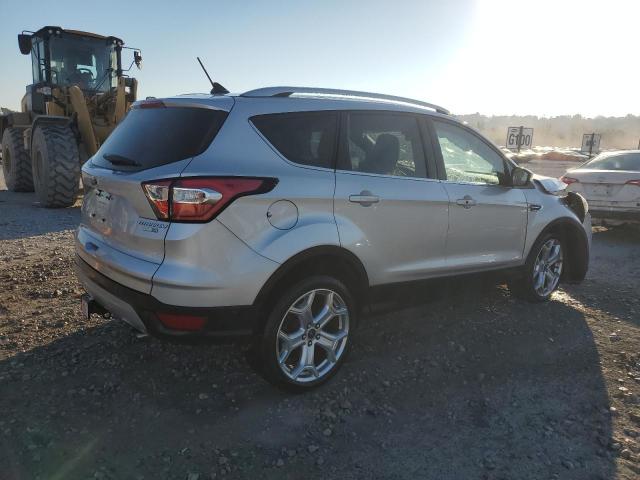 Photo 3 from auction – 2018 FORD ESCAPE TIT with VIN 1FMCU9J98JUA94329