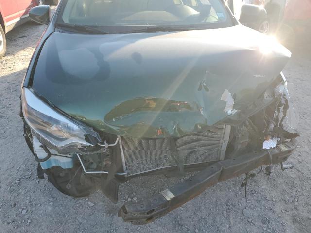 Photo 11 from auction – 2014 TOYOTA COROLLA EC with VIN 2T1BPRHEXEC165656
