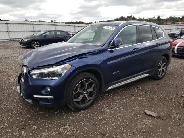 BMW X1 XDRIVE2 2017 with VIN WBXHT3C33H5F87171 - Photo from auction