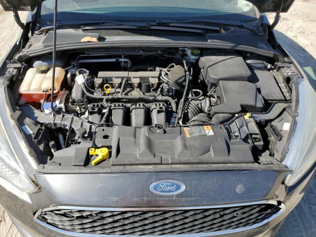 Photo 11 from auction – 2015 FORD FOCUS S with VIN 1FADP3E23FL228614