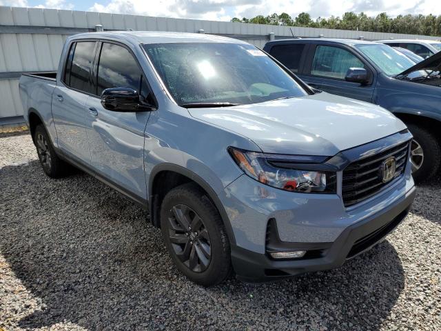 Photo 4 from auction – 2023 HONDA RIDGELINE with VIN 5FPYK3F11PB038600