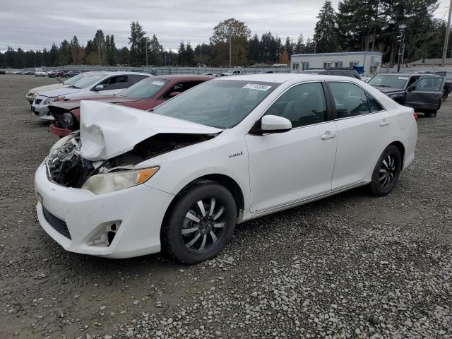 Photo 1 from auction – 2012 TOYOTA CAMRY HYBR with VIN 4T1BD1FK9CU007176