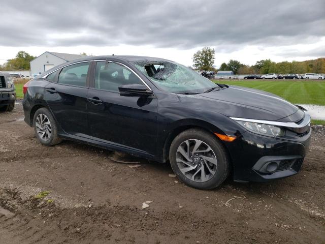 Photo 4 from auction – 2018 HONDA CIVIC EX with VIN 19XFC2F86JE021759