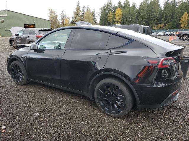 Photo 2 from auction – 2022 TESLA MODEL Y with VIN 7SAYGDEE1NF443196