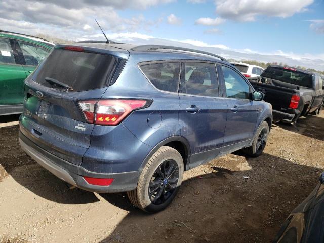 Photo 3 from auction – 2018 FORD ESCAPE SE with VIN 1FMCU0GD2JUC32356