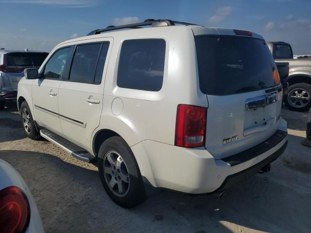 Photo 2 from auction – 2011 HONDA PILOT TOUR with VIN 5FNYF4H90BB041678