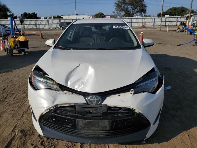 Photo 5 from auction – 2017 TOYOTA COROLLA L with VIN 5YFBURHE6HP679789