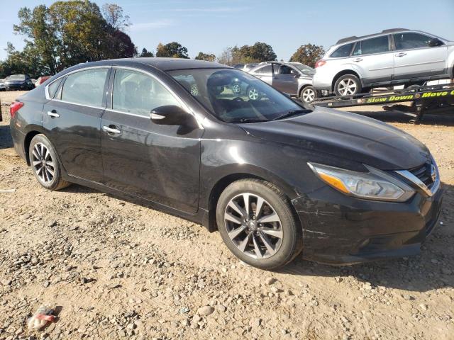 Photo 4 from auction – 2016 NISSAN ALTIMA 2.5 with VIN 1N4AL3AP1GC120526