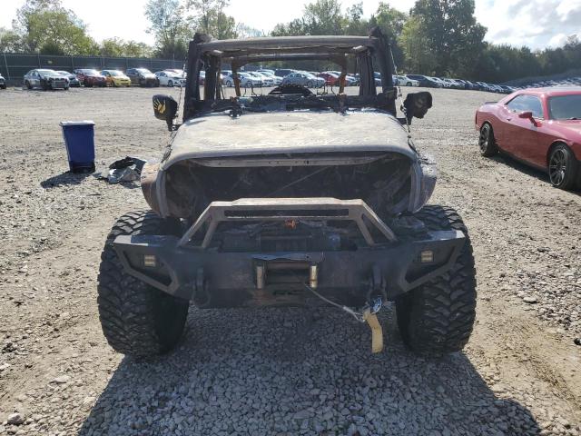 Photo 5 from auction – 2011 JEEP WRANGLER U with VIN 1J4BA5H19BL529734