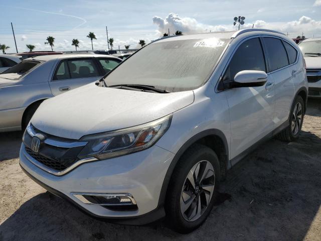 Photo 1 from auction – 2016 HONDA CR-V TOURI with VIN 5J6RM4H97GL078705
