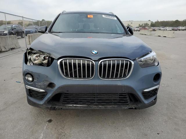 Photo 5 from auction – 2017 BMW X1 XDRIVE2 with VIN WBXHT3C30H5F72112