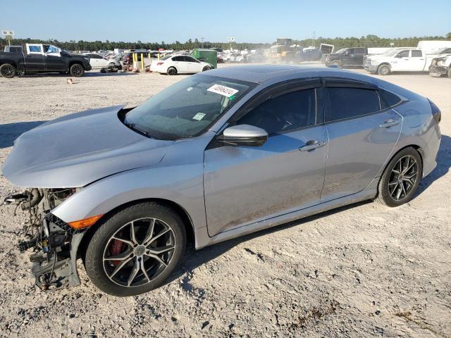 HONDA CIVIC EX 2017 with VIN 19XFC1F39HE025829 - Photo from auction