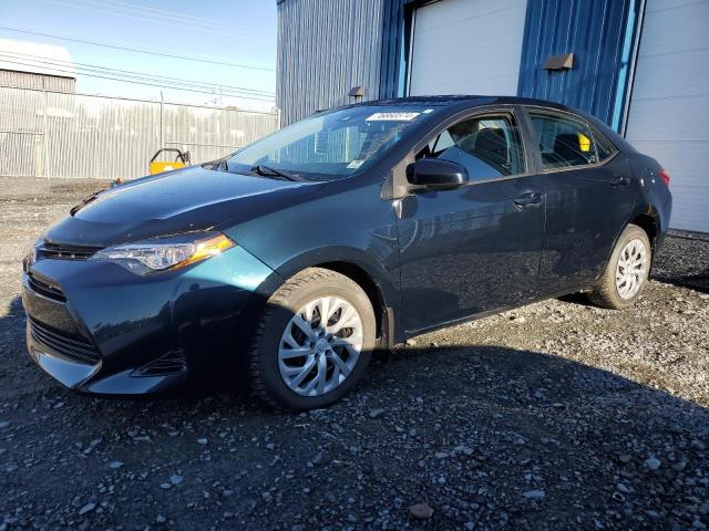 TOYOTA COROLLA L 2018 with VIN 2T1BURHE3JC982695 - Photo from auction