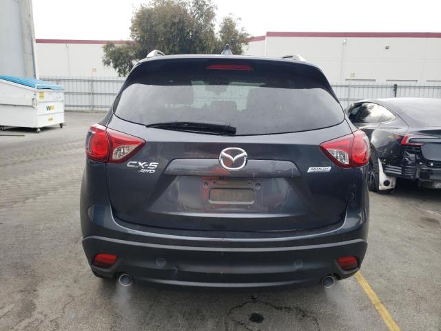 Photo 6 from auction – 2014 MAZDA CX-5 GT with VIN JM3KE4DY9E0420694