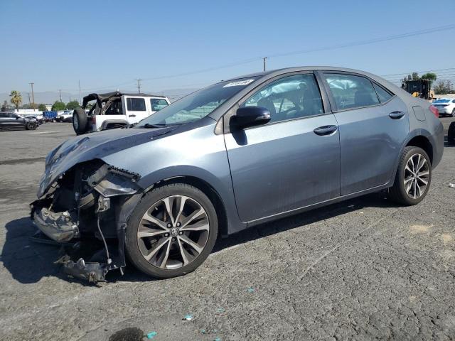 TOYOTA COROLLA L 2017 with VIN 5YFBURHE7HP658661 - Photo from auction