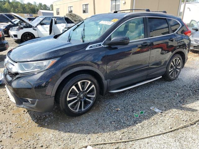 HONDA CR-V EXL 2017 with VIN 5J6RW2H83HL014667 - Photo from auction