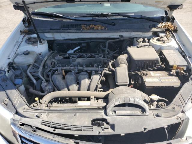 Photo 11 from auction – 2009 KIA OPTIMA LX with VIN KNAGE228195299932