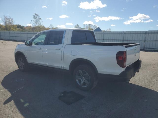Photo 2 from auction – 2023 HONDA RIDGELINE with VIN 5FPYK3F59PB059293