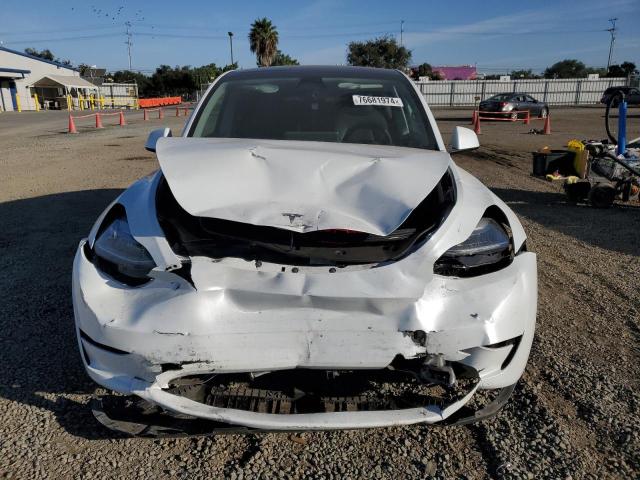 Photo 5 from auction – 2023 TESLA MODEL Y with VIN 7SAYGDEE5PA130152