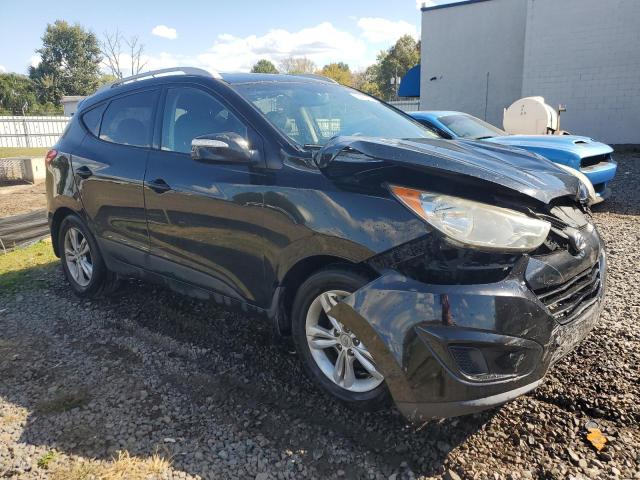 Photo 4 from auction – 2012 HYUNDAI TUCSON GLS with VIN KM8JUCACXCU542007