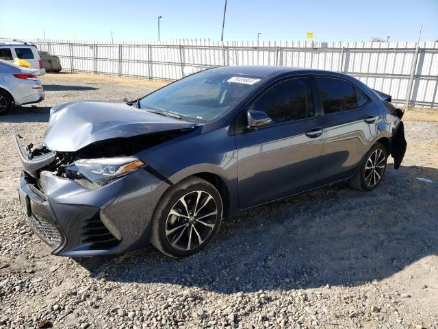 TOYOTA COROLLA L 2017 with VIN 5YFBURHE4HP701093 - Photo from auction