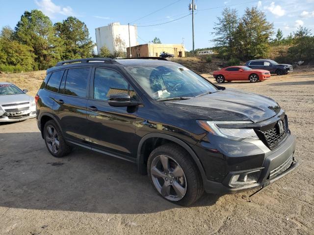 Photo 4 from auction – 2021 HONDA PASSPORT T with VIN 5FNYF8H93MB040910
