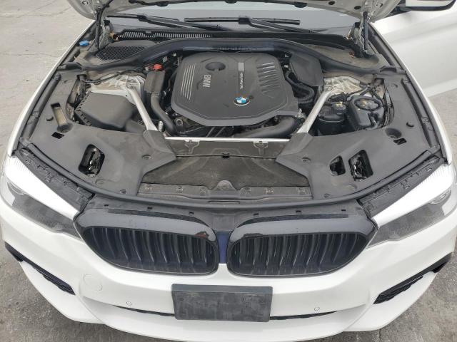 Photo 11 from auction – 2019 BMW 540 I with VIN WBAJE5C55KWW13691