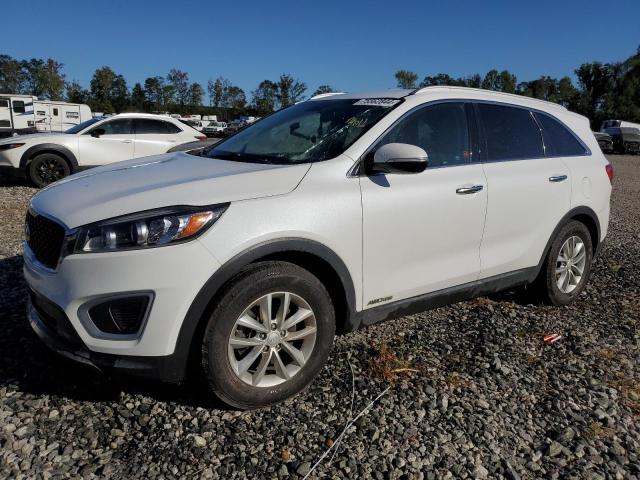 KIA SORENTO LX 2018 with VIN 5XYPGDA56JG428890 - Photo from auction