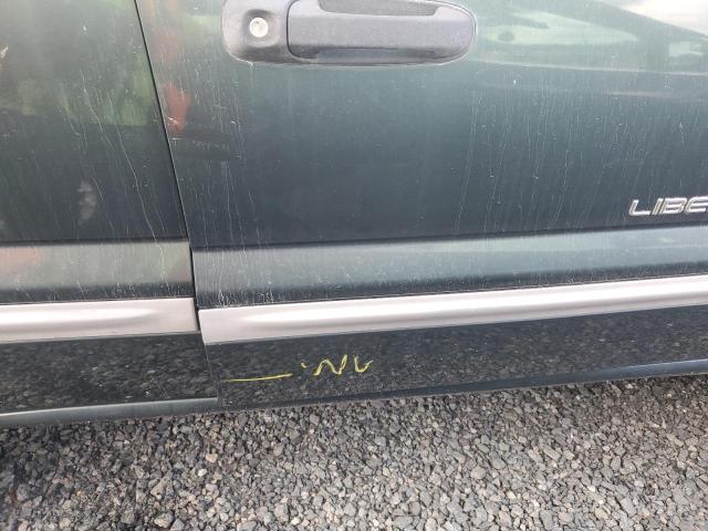 Photo 13 from auction – 2002 JEEP LIBERTY SP with VIN 1J4GK48K42W306053