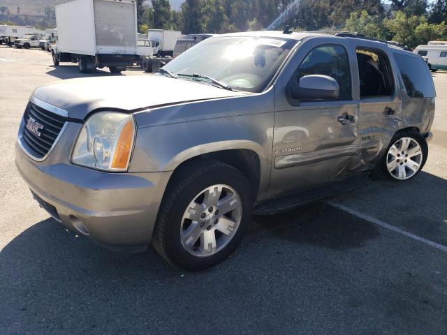 GMC YUKON 2007 with VIN 1GKFC130X7R293919 - Photo from auction
