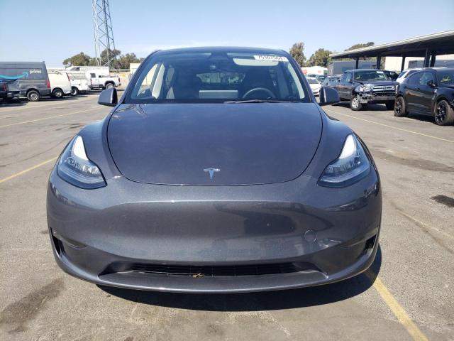 Photo 5 from auction – 2023 TESLA MODEL Y with VIN 7SAYGDEE3PA045200