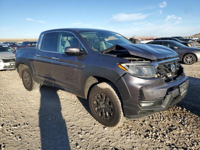 Photo 4 from auction – 2022 HONDA RIDGELINE with VIN 5FPYK3F79NB019536