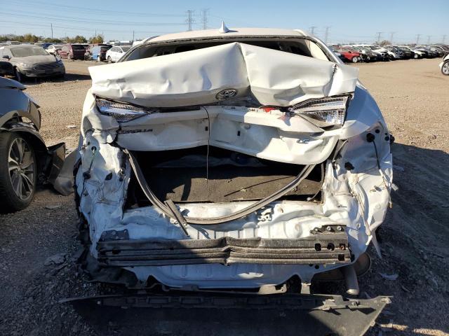 Photo 6 from auction – 2021 TOYOTA COROLLA LE with VIN JTDEPMAE7MJ140758