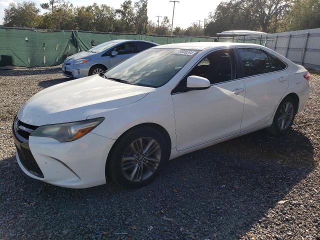 TOYOTA CAMRY LE 2016 with VIN 4T1BF1FK0GU148721 - Photo from auction