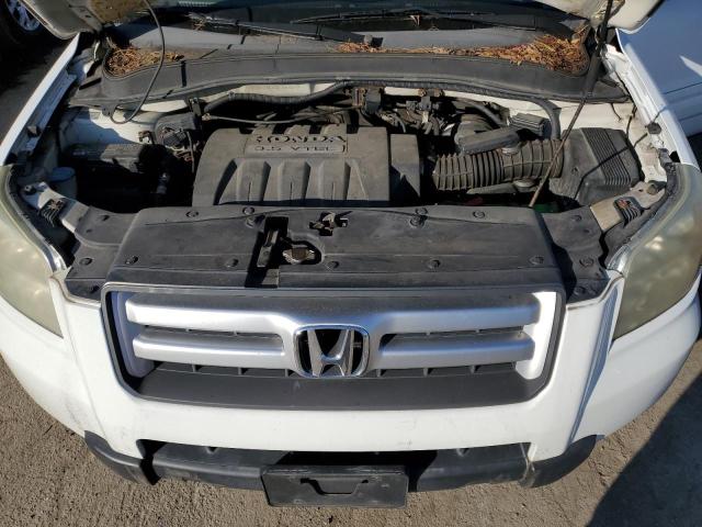 Photo 12 from auction – 2006 HONDA PILOT EX with VIN 5FNYF18566B018343