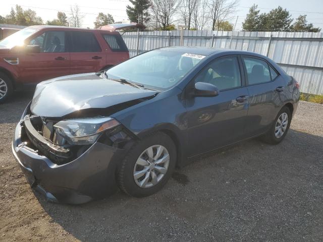 TOYOTA COROLLA L 2015 with VIN 2T1BURHE6FC339698 - Photo from auction