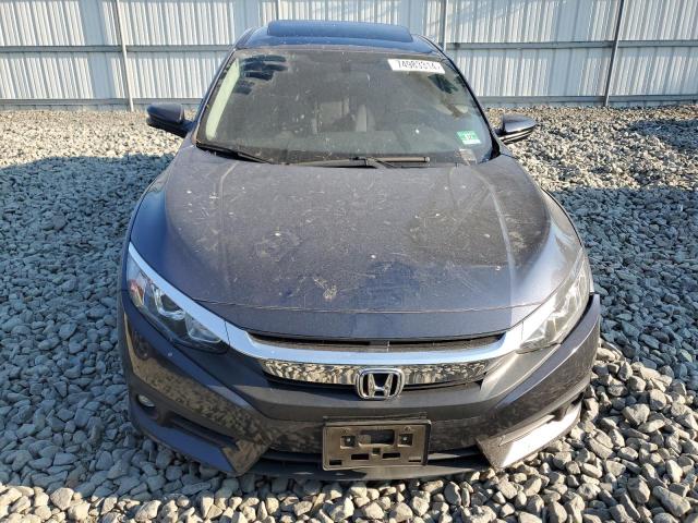 Photo 5 from auction – 2018 HONDA CIVIC EX with VIN JHMFC1F35JX032393